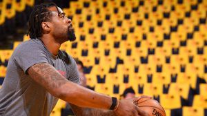 DeAndre Jordan hides a device under his wristband
